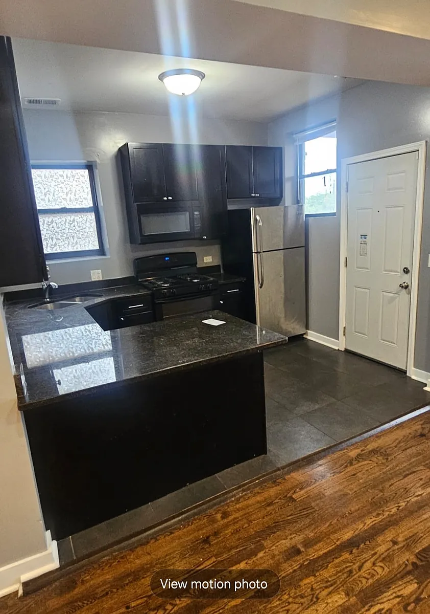 Building Photo - 6846 S Cornell Ave #2S