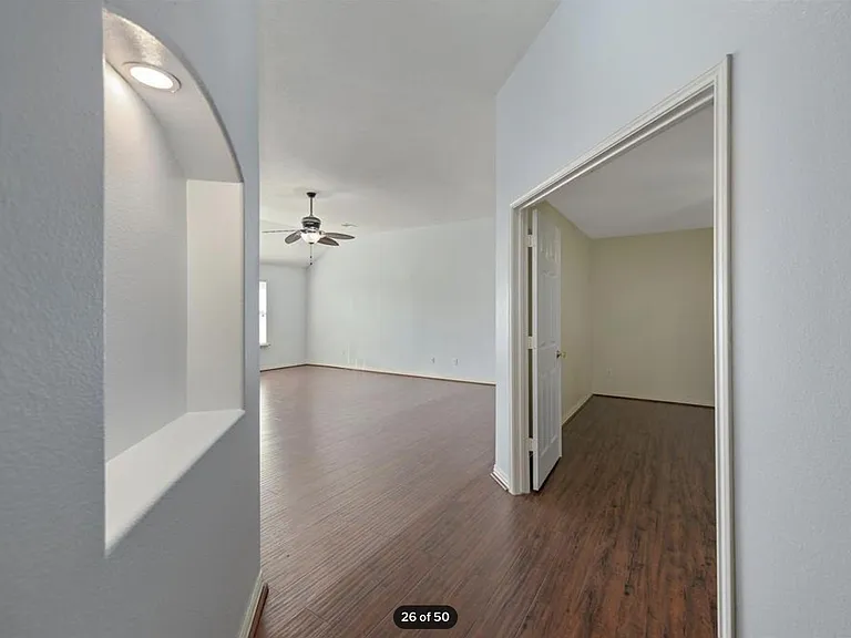 Hallway leading to big family and media rooms