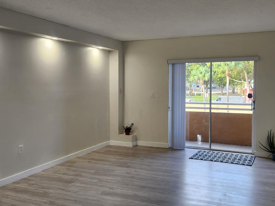 Living room with balcony and street view