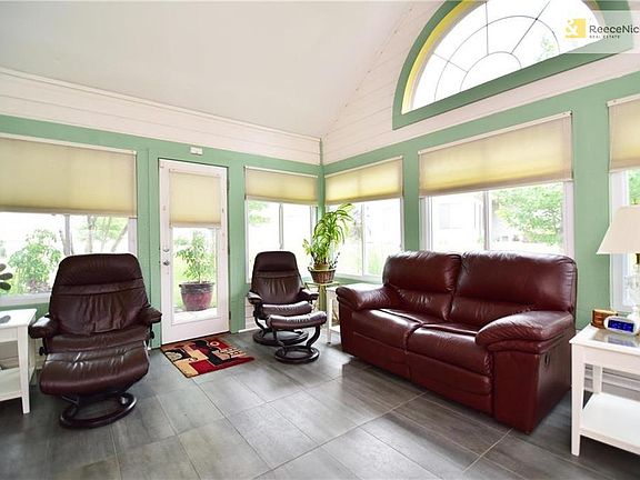 Desirable end-unit sides to green space and tucked away from the streets