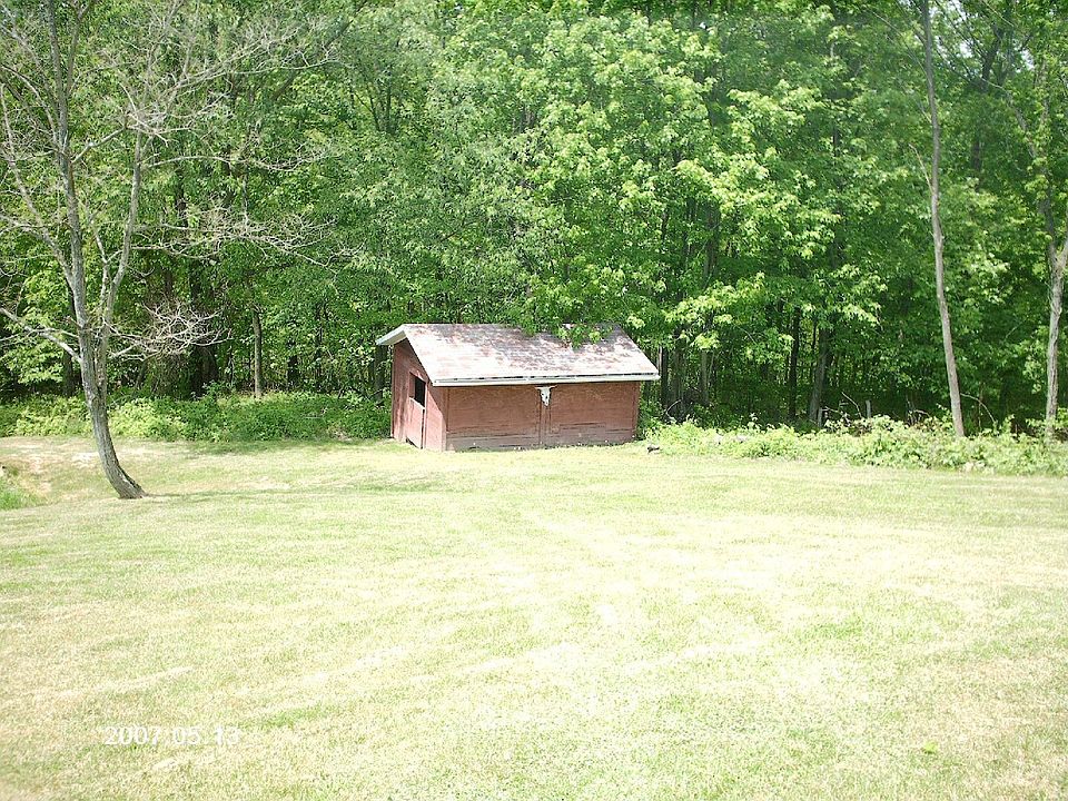 Barn next to pond
