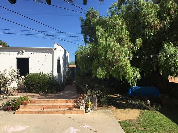 Backyard from patio (bldg on left is detached garage)