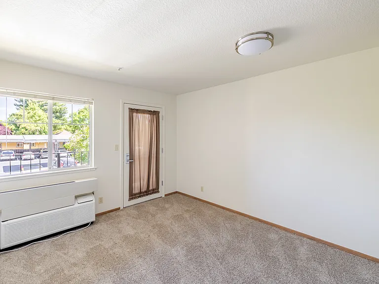 Cozy living space is filled with natural light.