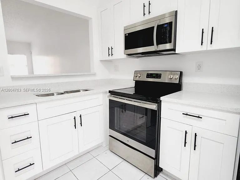 6960 NW 174th Ter #706 — Photo 10