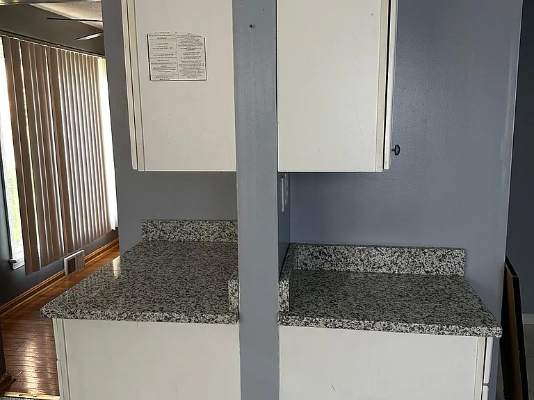 Kitchen with granite countertop, spacious countertops