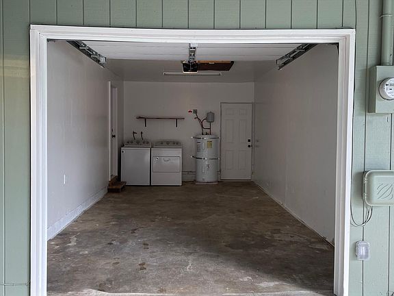 One-car garage with washer and dryer.
