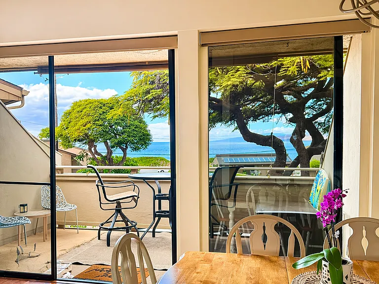 Dining area with ocean views and access to Kitchen.