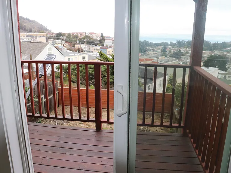 balcony and and access to back yard