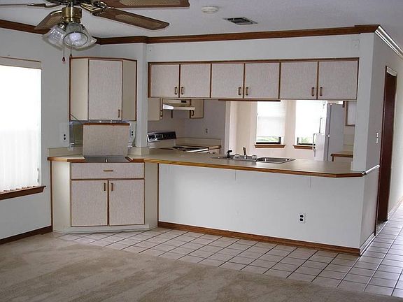 Living room looking into kitchen