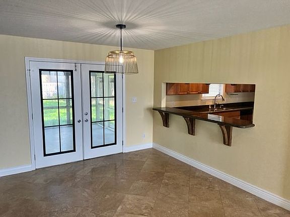 5th image of 215 Dolphin Estates Ct
