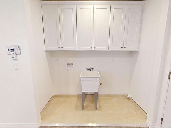 Convenient laundry hookups located right next to the kitchen