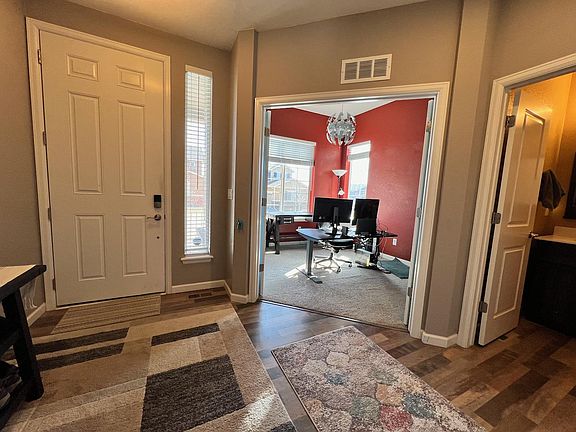 Front hallway, showing entrance to office and hall bath.