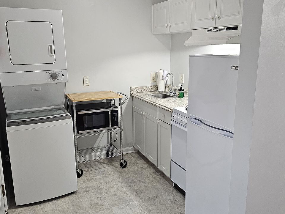 Front door enters into full kitchen