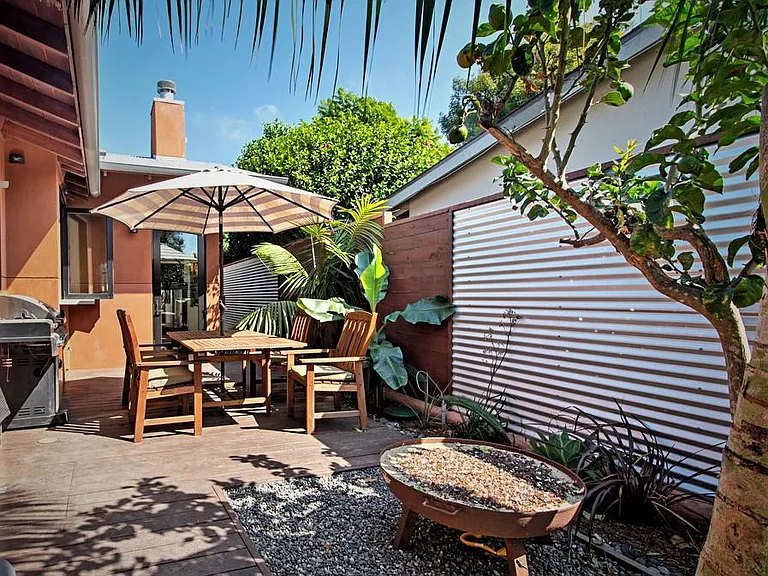 Back Deck with firepit, outdoor dining, natural gas BBQ - Open Caribbean window left of dining