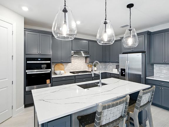 Open kitchen with decorative backsplash