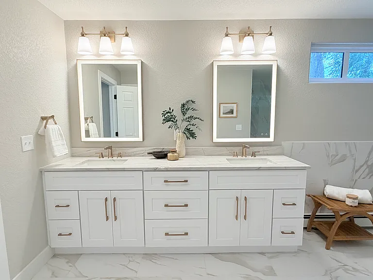 LED lit mirrors, double vanity in primary bathroom