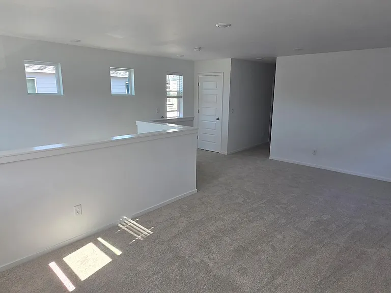 Bonus room upstairs with lots of windows and a large closet.