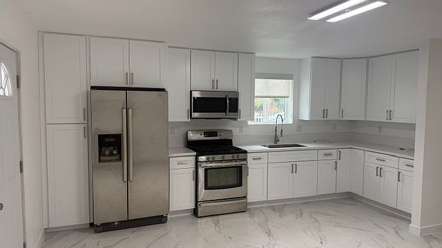 1st image of 1155 E 81st St #A