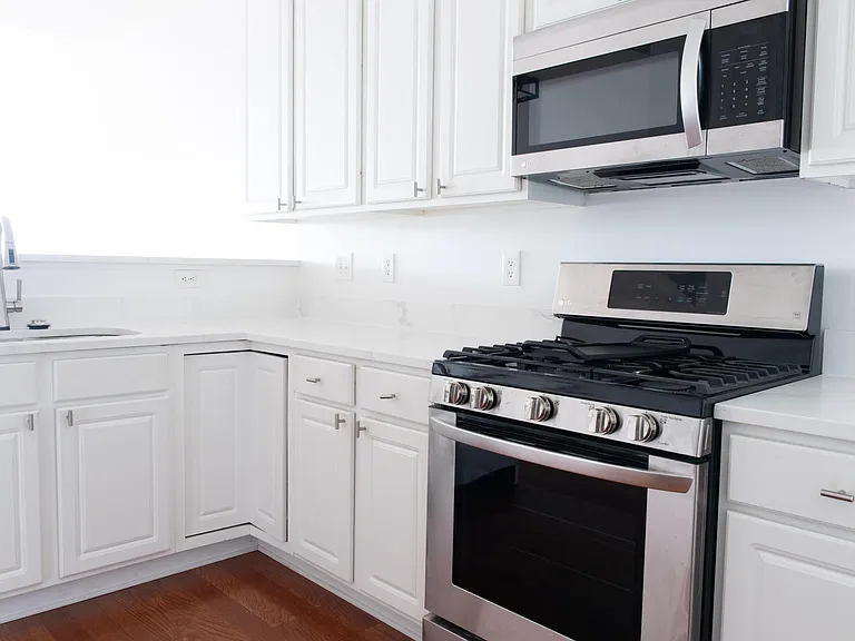Beautiful, luxe updated kitchen with quartz counters