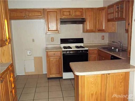 Kitchen includes gas stove and dishwasher only