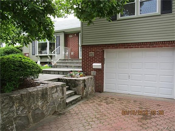 Beautiful stone walkway with driveway pavers!