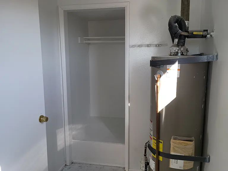 Laundry room storage area.