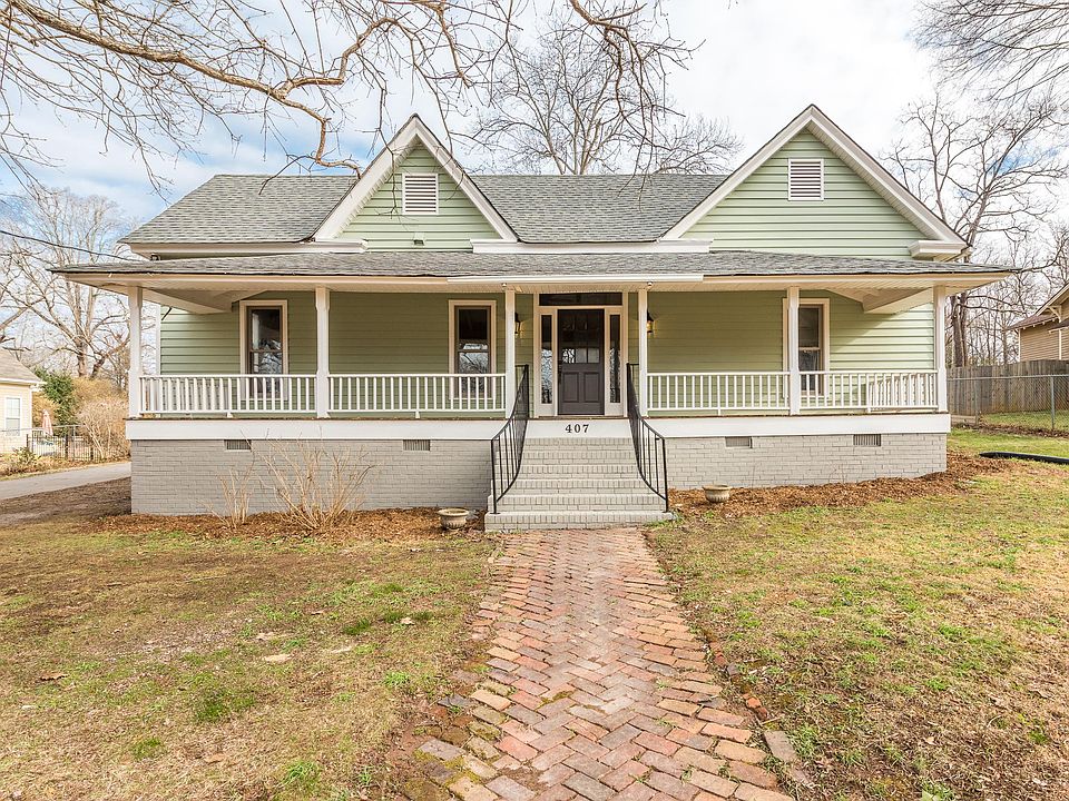 Front view with large sitting porch