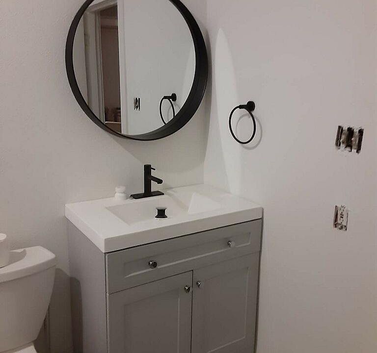 Renovated bathroom with black matte fixtures