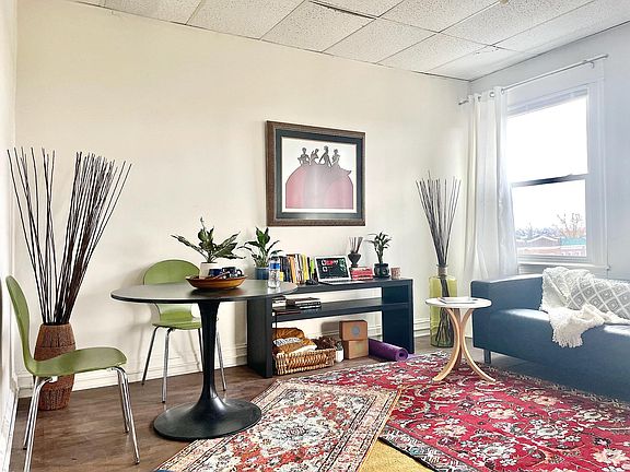 The living room is large enough for a dining area
