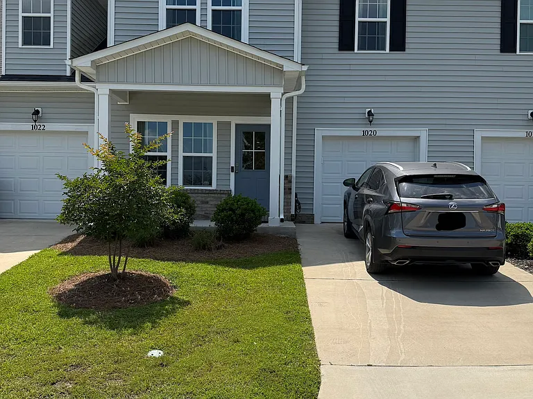 Front of the unit facing a pond