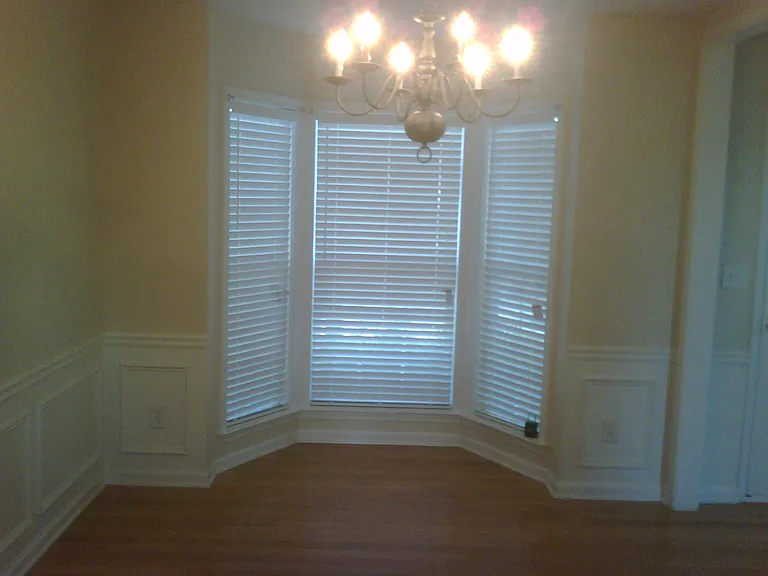 Dining v1. Please note: First-floor flooring was upgraded to beautiful, brand-new luxury vinyl flooring in late 2024. Updated flooring photos will be added soon. This applies to all first floor pictures.