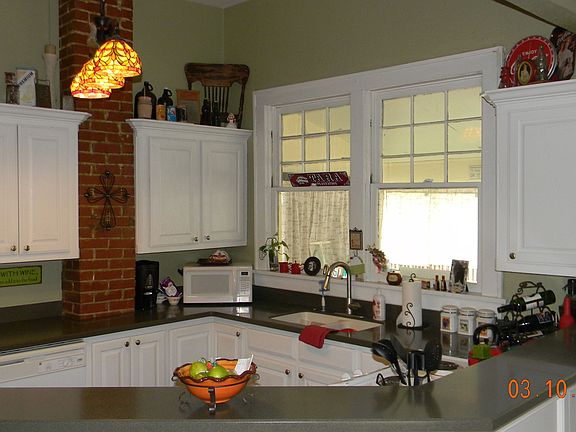 Newly remodeled kitchen with new appliances and Corian countertops