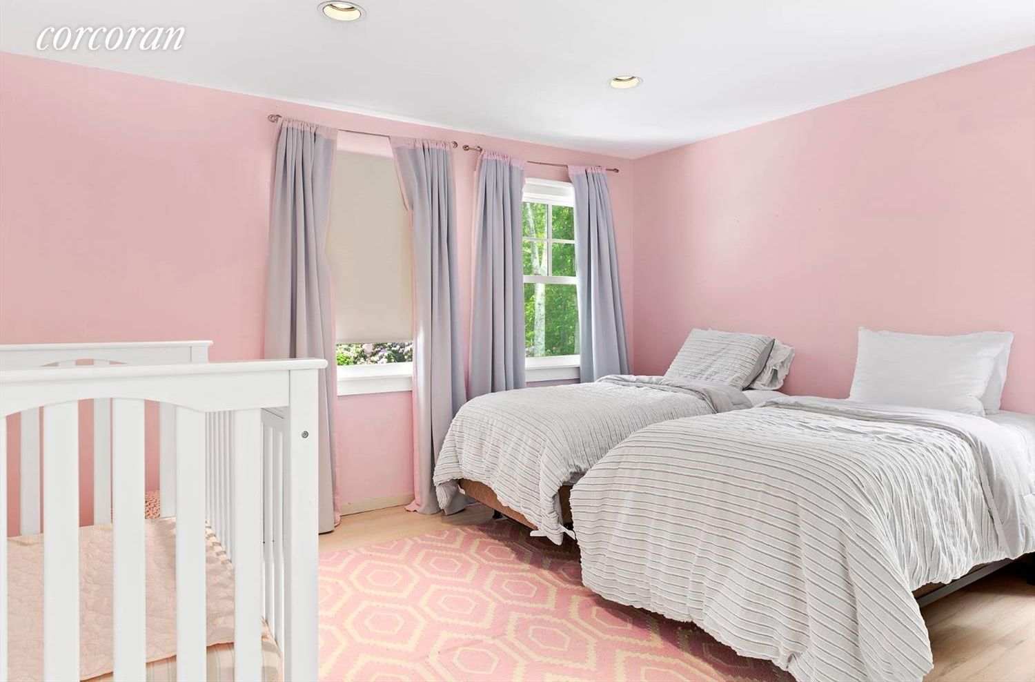  Children's room with Pottery Barn crib and black out curtains