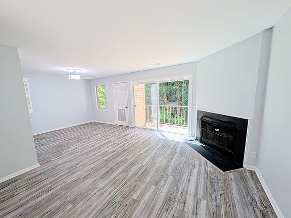 Living room with wood burning fireplace (functional)