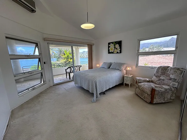 Bedroom 2 with balcony looking out to Lake
