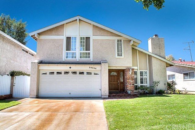 This spacious family home boasts handsome curb appeal, nestled in a quiet pocket of homes, 2111 of open and bright living space, and sparkling pool.