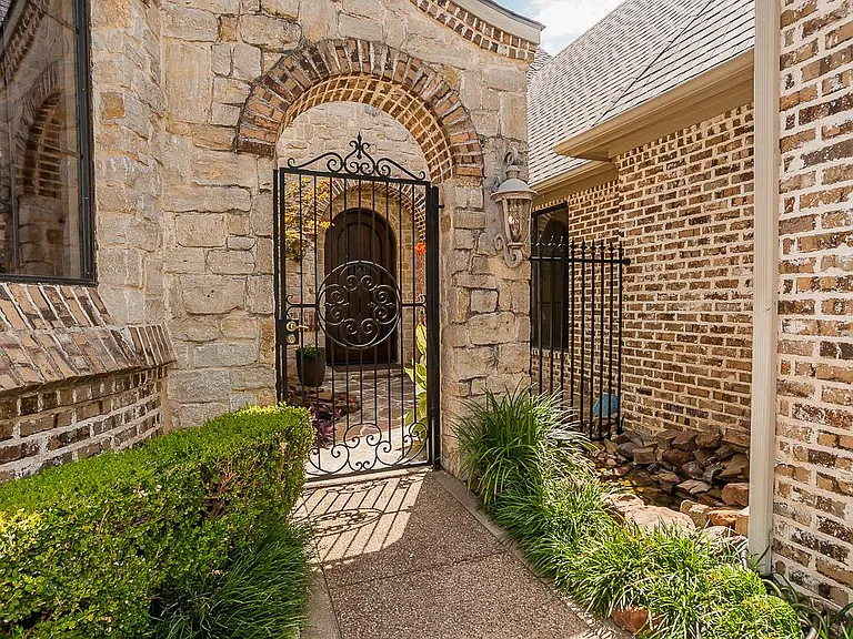 Iron Gate Welcomes You Into The Courtyard.