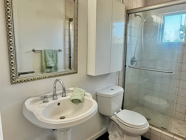 Updated Premium Fixtures in well ventilated, spacious bath.