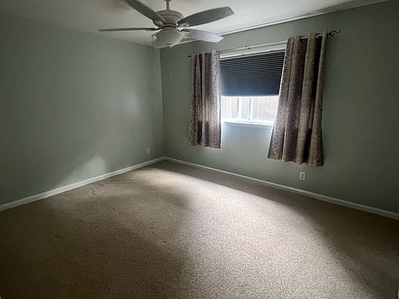 Newly painted bedroom w/ blackout shade