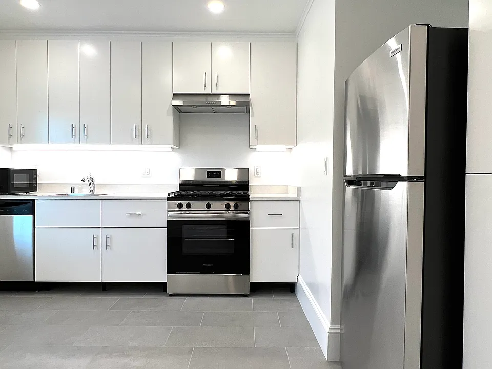 Large eat-in kitchen with ALL NEW everything. Counters, fixtures, appliances, etc. It's like moving into a new home!