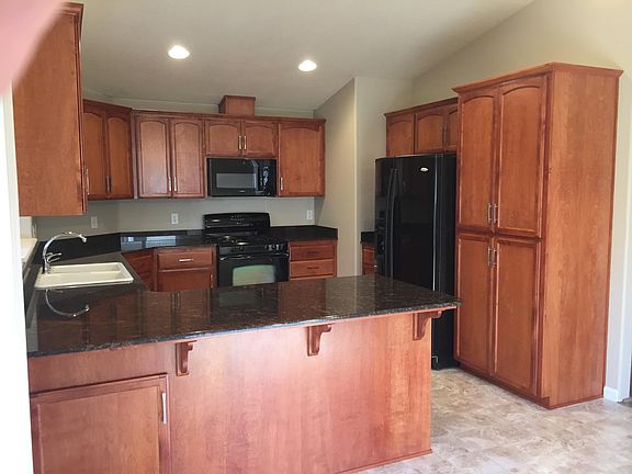 Kitchen with vaulted ceiling