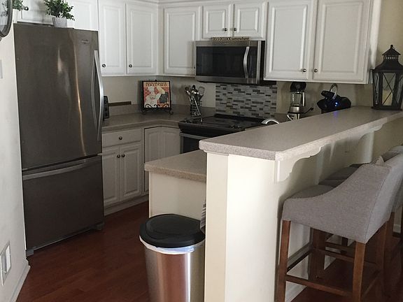 Kitchen with sitting bar