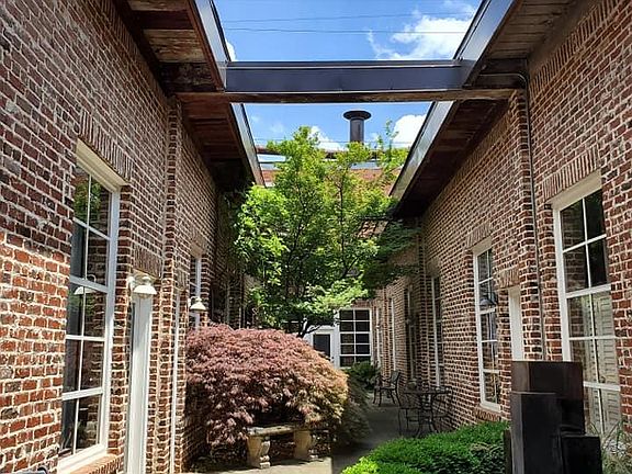 Unit is located off this beautiful and quiet courtyard.