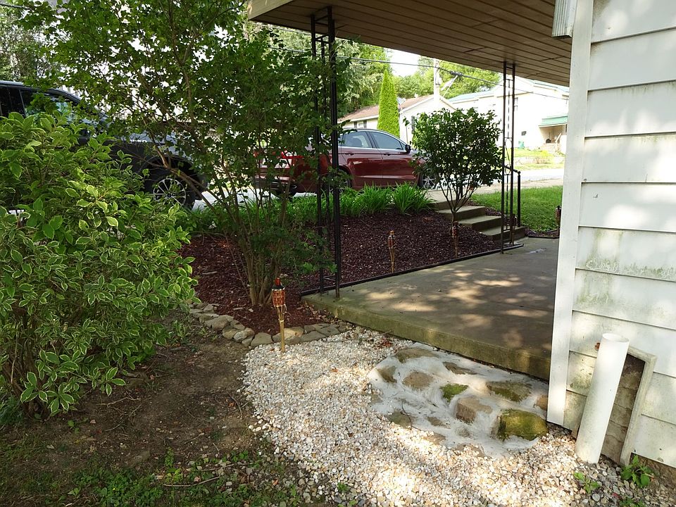 View from the side of the house to the front porch