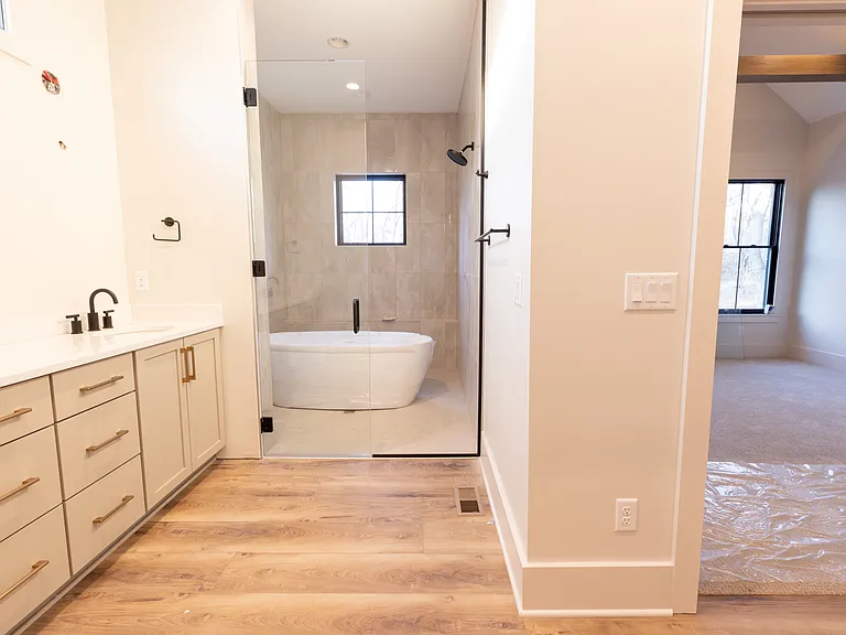 Master bathroom. Entrance to master bedroom. (before mirrors were hung)
