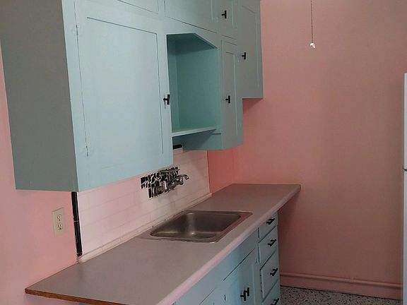 Kitchen cupboards are freshly painted
