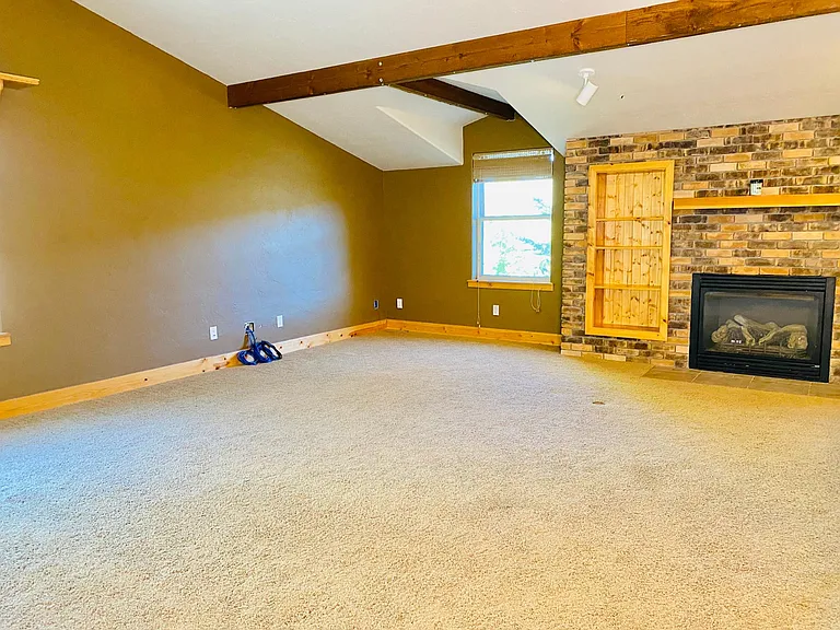 living room with gas fireplace