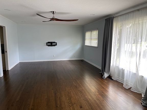 Additional family room off the kitchen may also be used as an office.