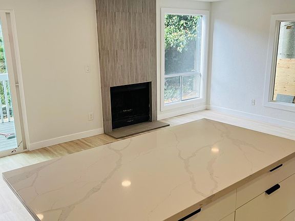 Plenty of kitchen storage with the addition of the standalone island/bar