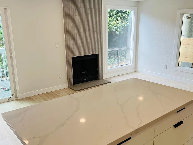 Plenty of kitchen storage with the addition of the standalone island/bar